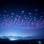 Corporate drone show over Bali at night.