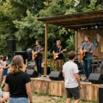 Sustainable event entertainment with live music and happy attendees.